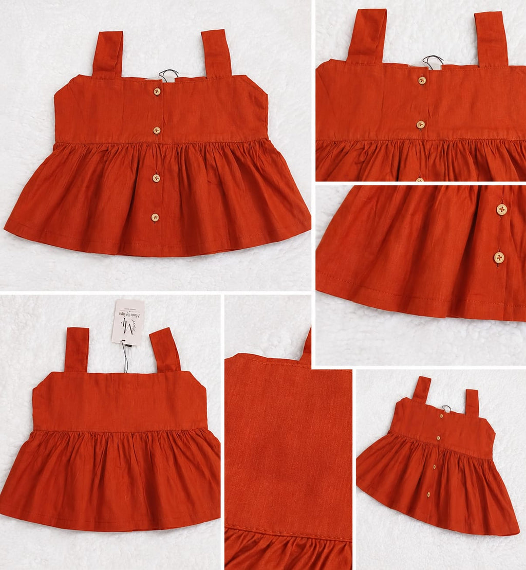 Rust orange girls lawn top with wooden button detailing