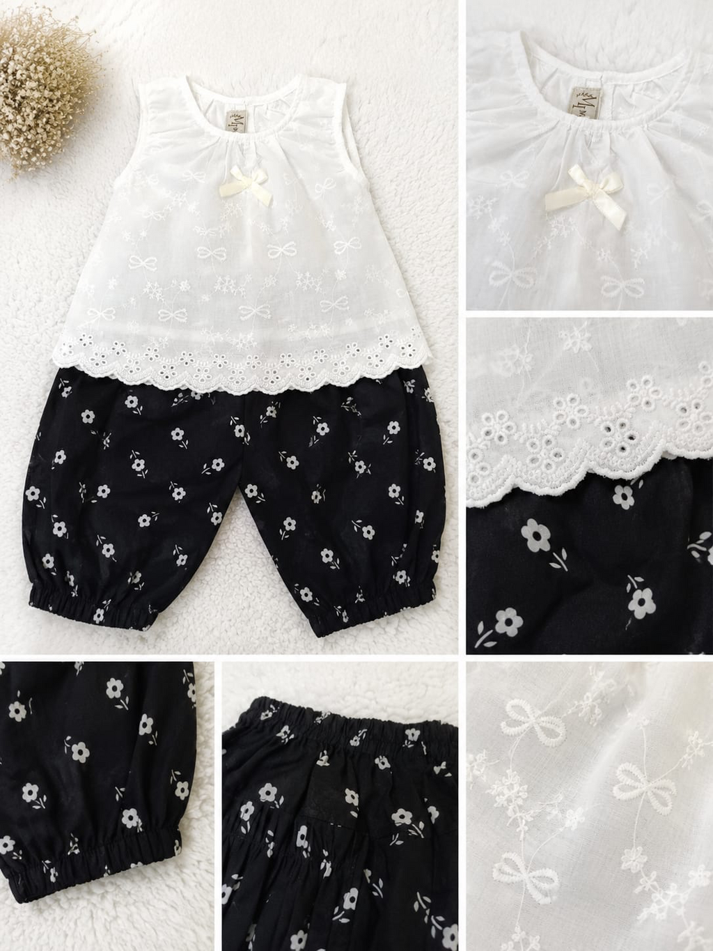 Black and white embroidered girls lawn outfit with floral trousers