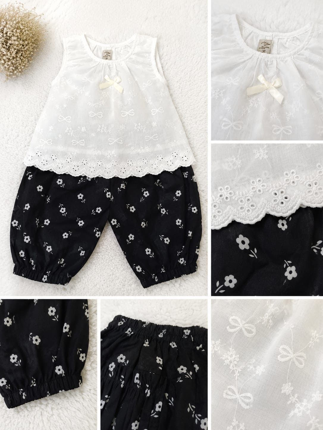 Black and white embroidered girls lawn outfit with floral trousers