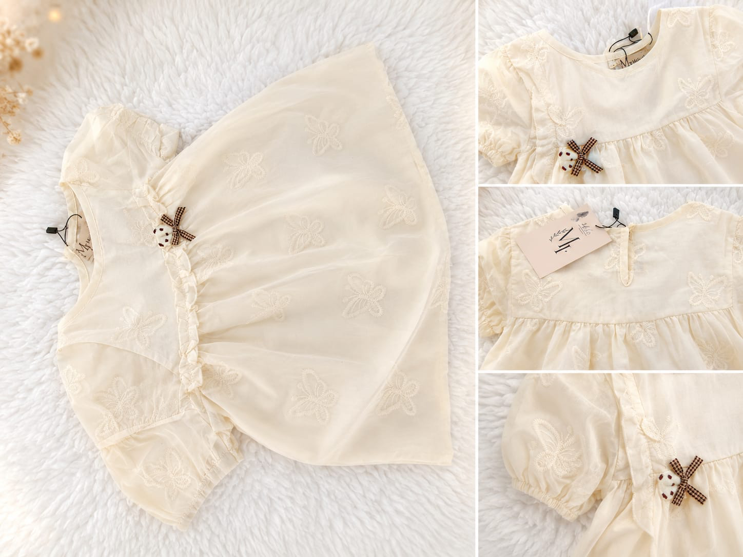 Ivory embroidered girls lawn frock with puff sleeves and bow detail